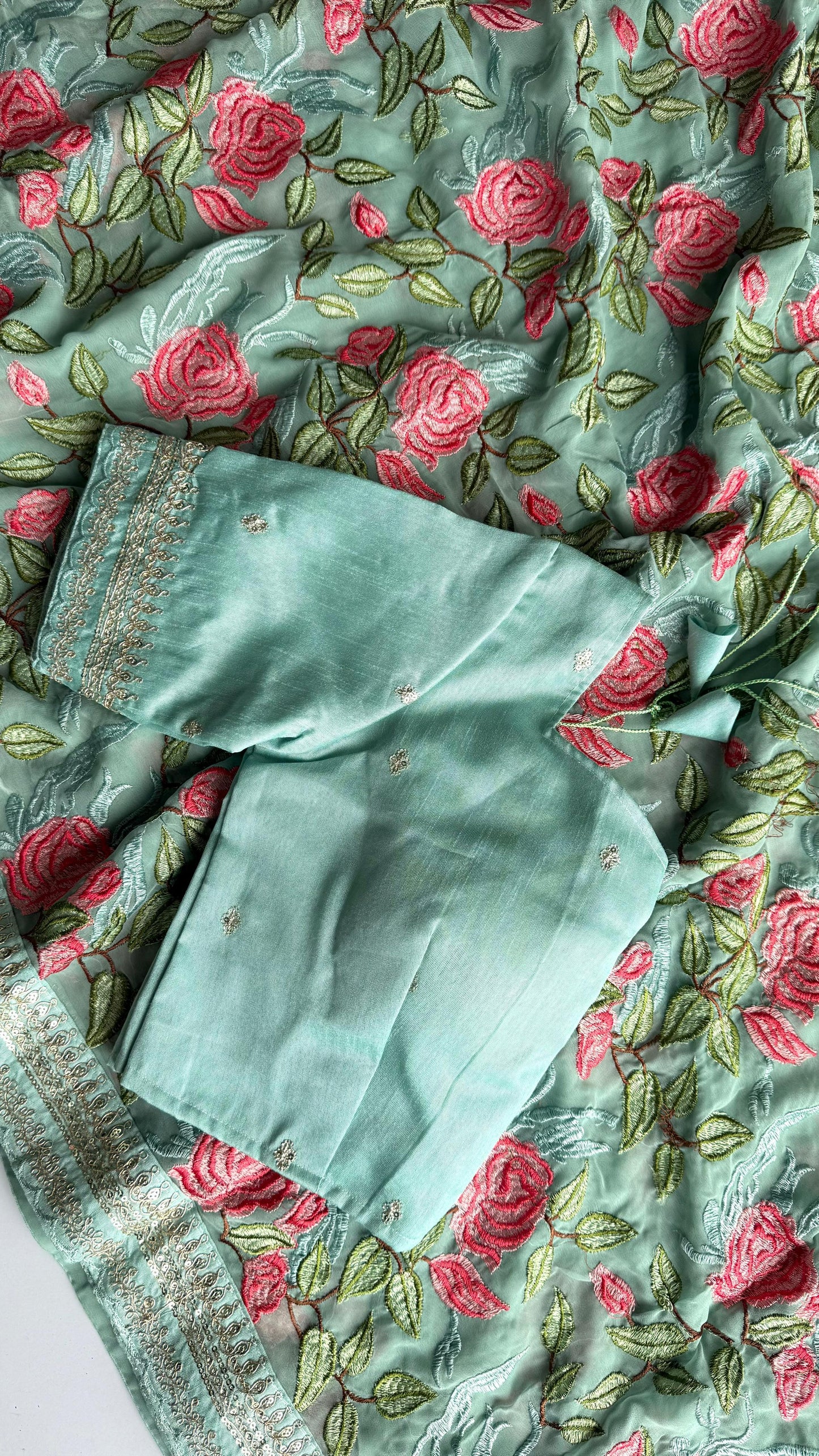 Sky  Georgette Saree with Rose Prints & Antique Border