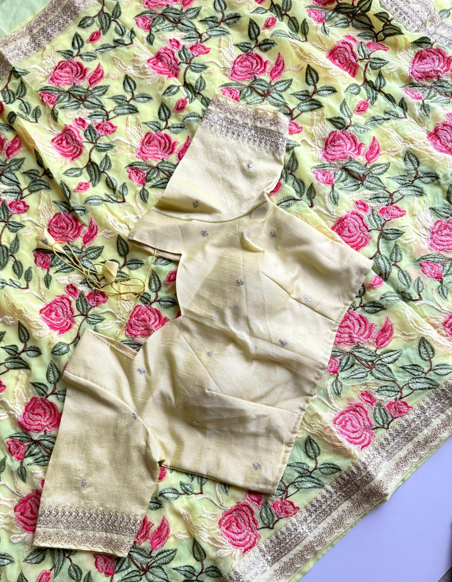 Yellow Georgette Saree with Rose Prints & Antique Border